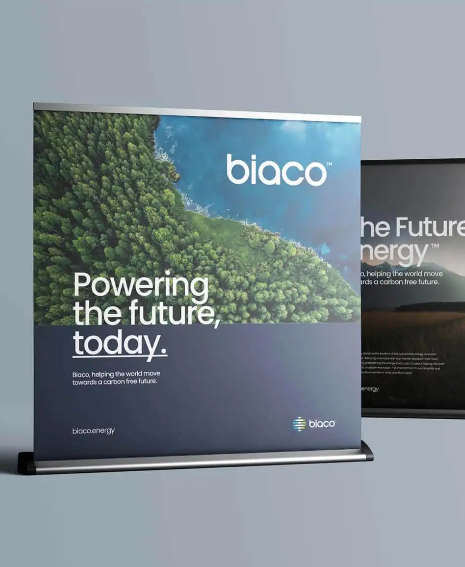 Pull-up banner showing Biaco logo, forest shoreline, and tagline ‘Powering the future, today.’