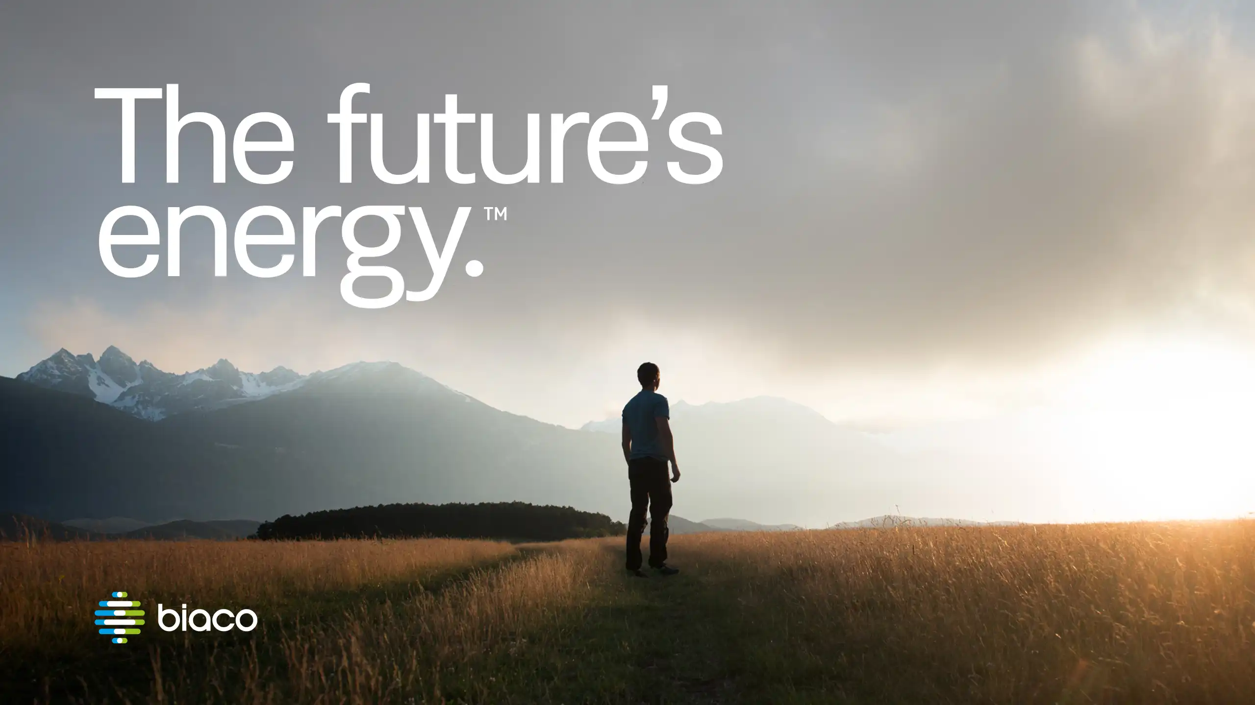 Person standing in a field at sunrise with Biaco logo and tagline.