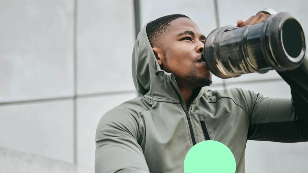 Person drinking water after exercise as part of the Tomorrow Wellness cardiovascular health campaign.
